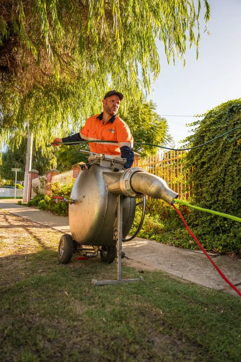 Plumbed Right tech on the trailer jetter on a suburban verge